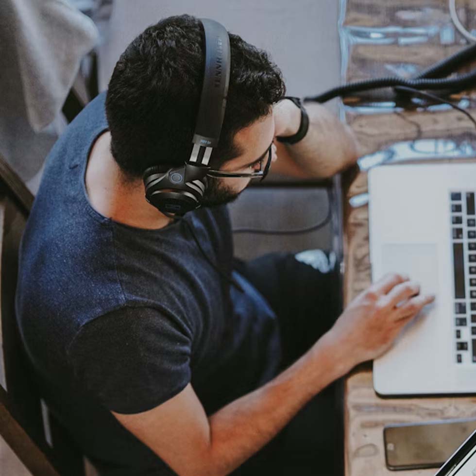 Software developer working on screen
